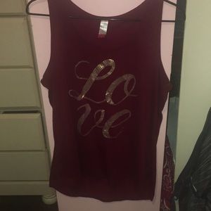 burgundy tank top with letters.